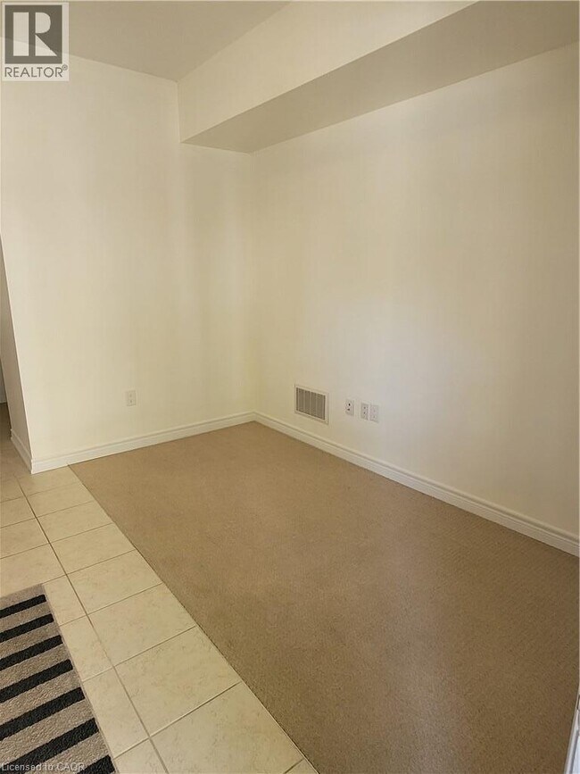 Photo du bâtiment - 1401 Plains Rd E