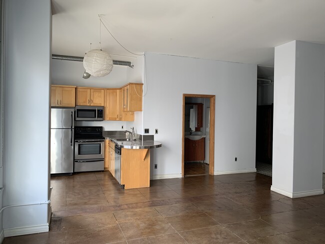 Full kitchen and full bathroom - 215 W 7th St