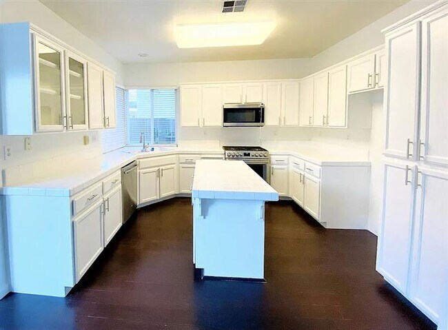 Building Photo - Welcome to this amazing move-in ready 4 be...