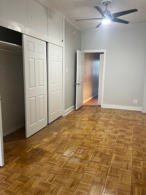 Living room with sliding door closet - 2113 Bleecker St