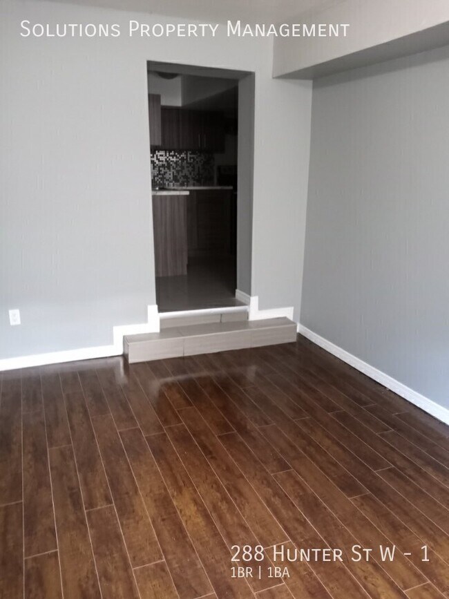 Building Photo - Cozy & Updated 1-Bedroom Apartment on a Charming Tree-Lined Street