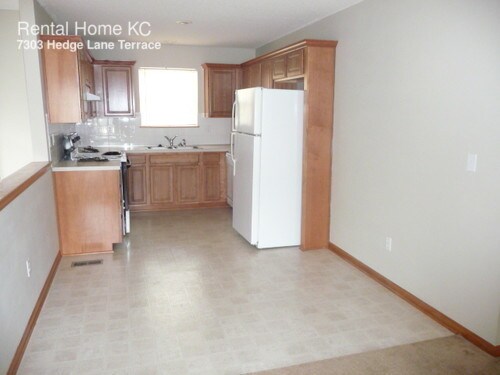 Building Photo - 7303 Hedge Lane Ter