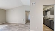 This single-floor residence combines modern finishes with a clean, neutral aesthetic throughout. The living area stands out with striking vaulted ceilings that lend a sense of openness and volume, complemented by wood-look plank flooring in a warm gray tone. A stylish multi-bulb pendant light fixture adds a contemporary touch near the entryway, which features a dedicated front door and ample wall space.

The kitchen is well-equipped and functional, featuring gray shaker-style cabinetry, granite countertops, a subway tile backsplash, a stainless steel sink, and stainless appliances including a range and dishwasher. Wood-look flooring continues seamlessly through this space, and ample upper and lower cabinetry provides generous storage.

The bedrooms are finished with plush carpet and ceiling fans for comfort, with natural light filtering through windows. Each room offers closet access and a calm, neutral palette ideal for a variety of design styles.

The bathroom is thoughtfully updated with a gray double-door vanity topped with granite, a round mirror with overhead lighting, and a tiled tub-and-shower surround with marble-style tile. Wood-look tile flooring ties the space together cohesively. Throughout the home, the consistent use of soft neutral tones and modern fixtures creates a clean, move-in-ready environment.