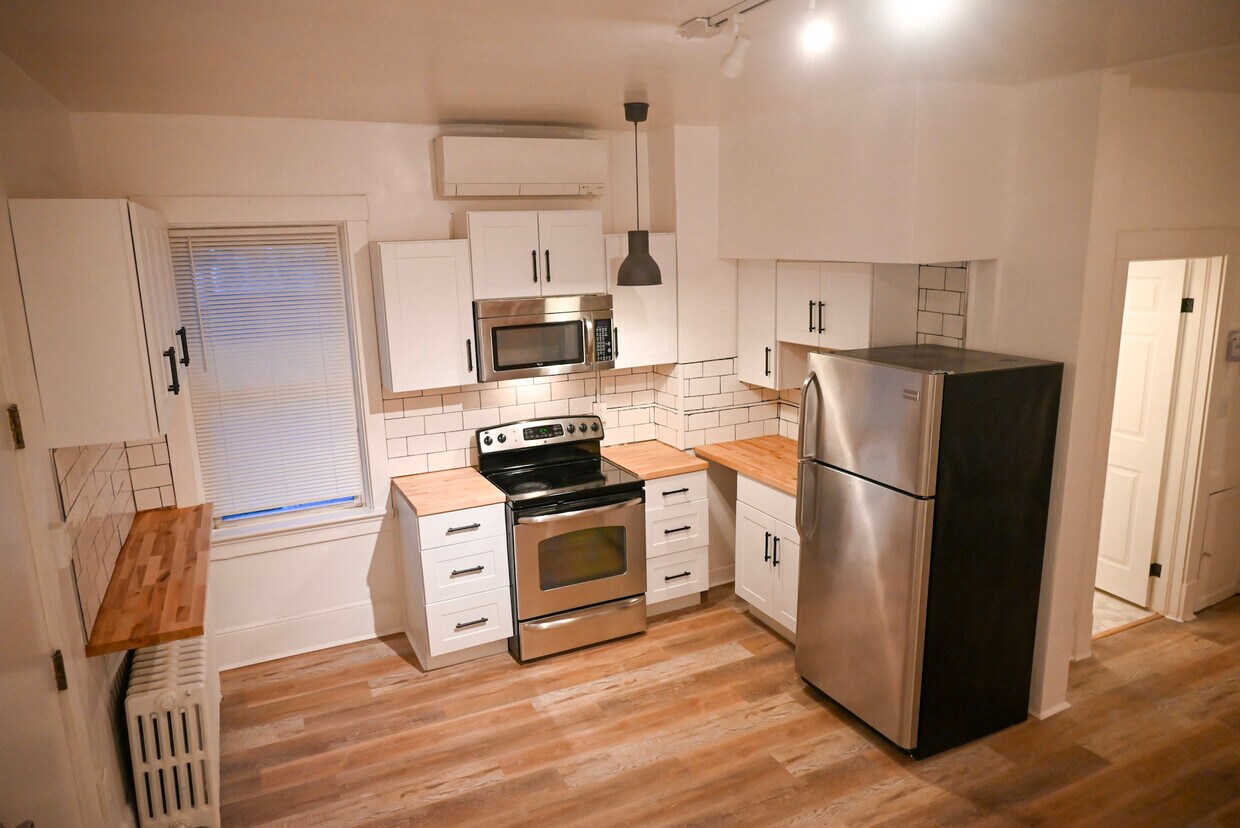Lots of room for a portal island or dining set to entertain! - 1406 Mount Royal Blvd