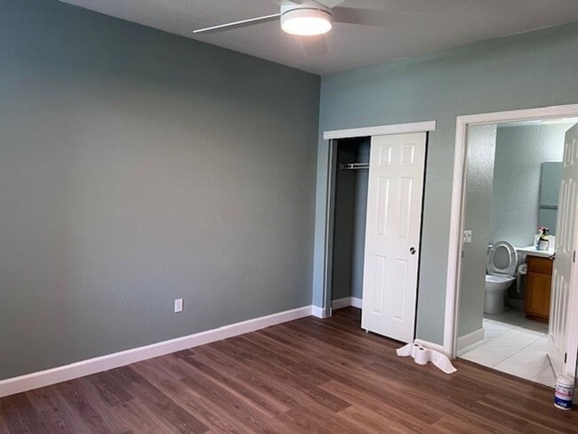 Building Photo - Beautifully updated condo in gated community. Sparkling pool. Stainless steel appliances and lami...