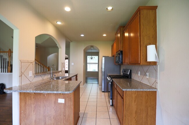 Foto del edificio - 5102 Heatherdawn Ct