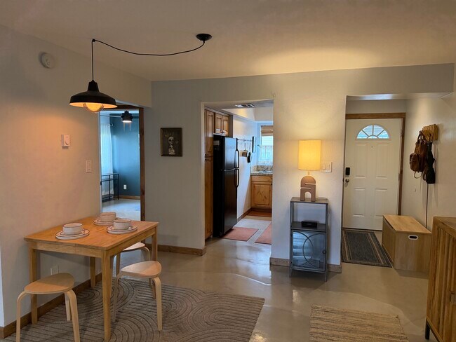 Living area into kitchen - 3200 S Litzler Dr