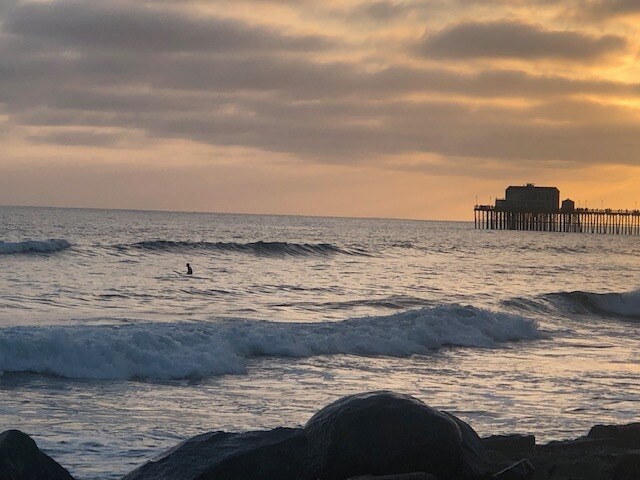 View from the property. Surfing and sunsets - 412 S The Strand