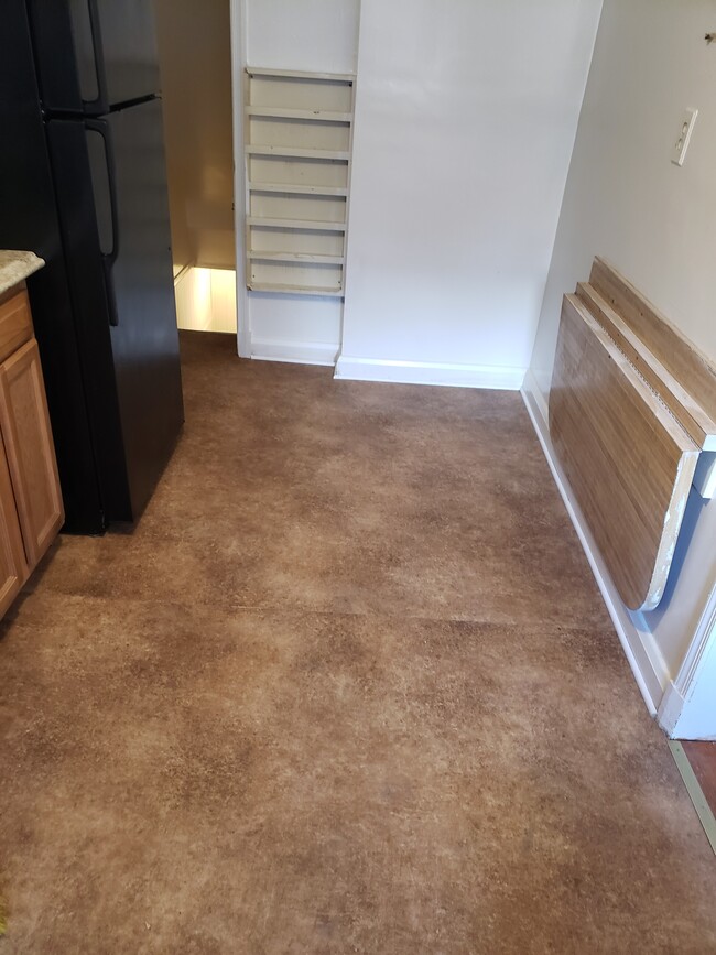 Current Kitchen floor but will be renovated in December 2024. - 1534 Barrett Rd