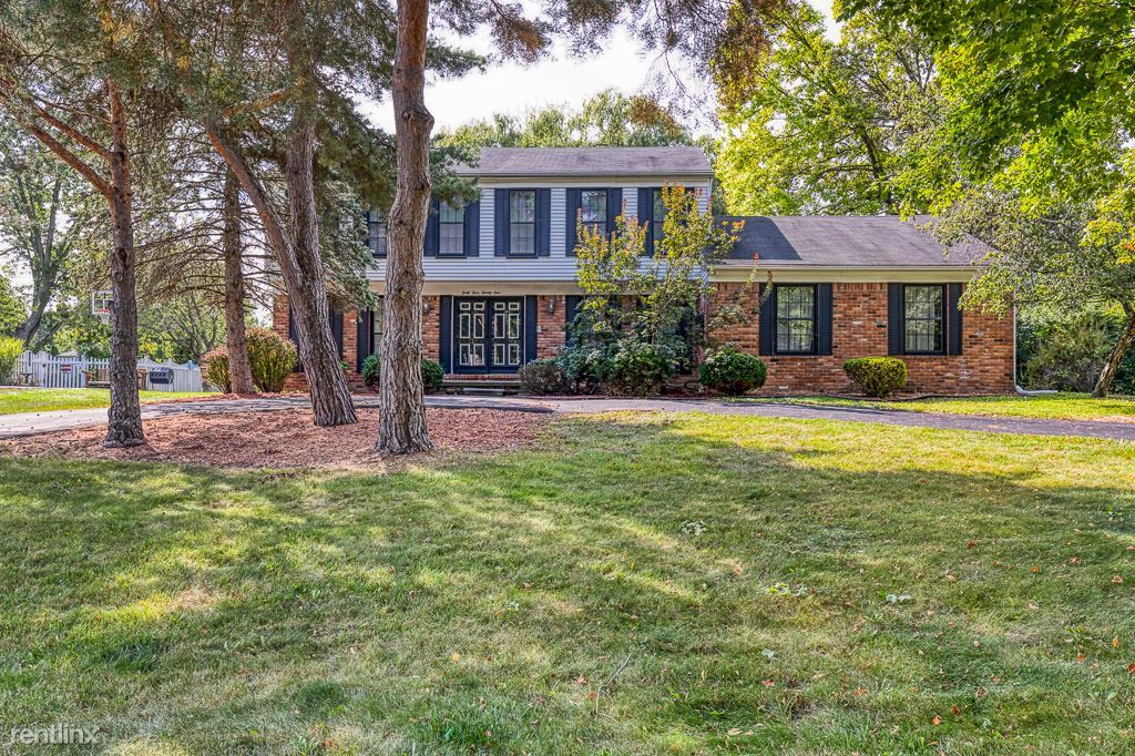 Foto principal - 4 br, 2.5 bath House - 4421 Walnut Woods Dr