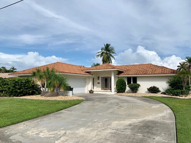 Building Photo - AVAILABLE 2027 SEASON! ! PGI HEATED POOL, WATERFRONT, BOAT LIFT