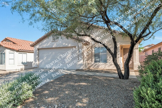 Building Photo - 5568 W Peaceful Dove Pl