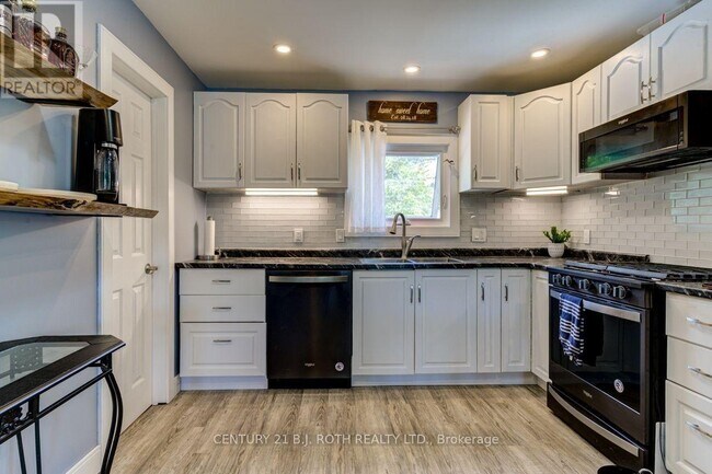 Photo du bâtiment - 1250 River Rd W