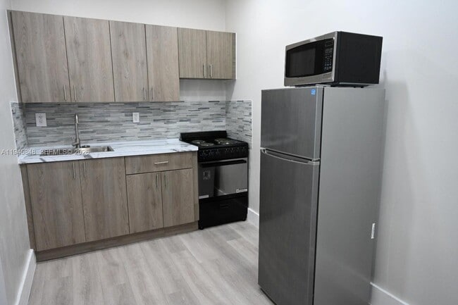 Building Photo - 7545 NW 3rd Ave