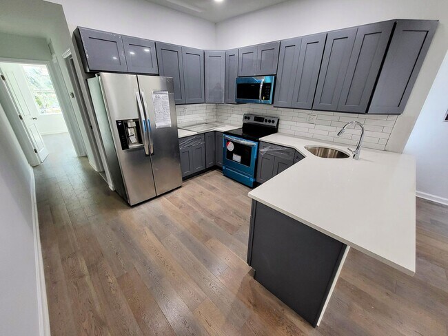 Building Photo - 1218 West Airdrie Street, Unit 2
