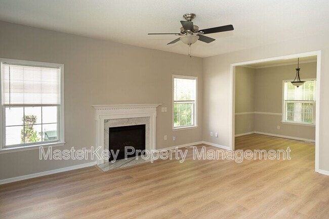 Building Photo - 7916 Strawberry Meadows St