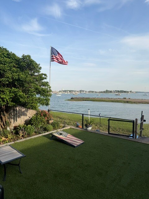 Landscaped yard with yard games - 87 Washington Ave