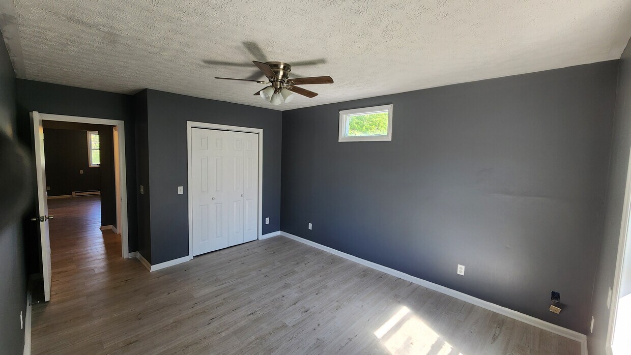 Bedroom 2 and its large lit and shelved closet - 305 Snidow St