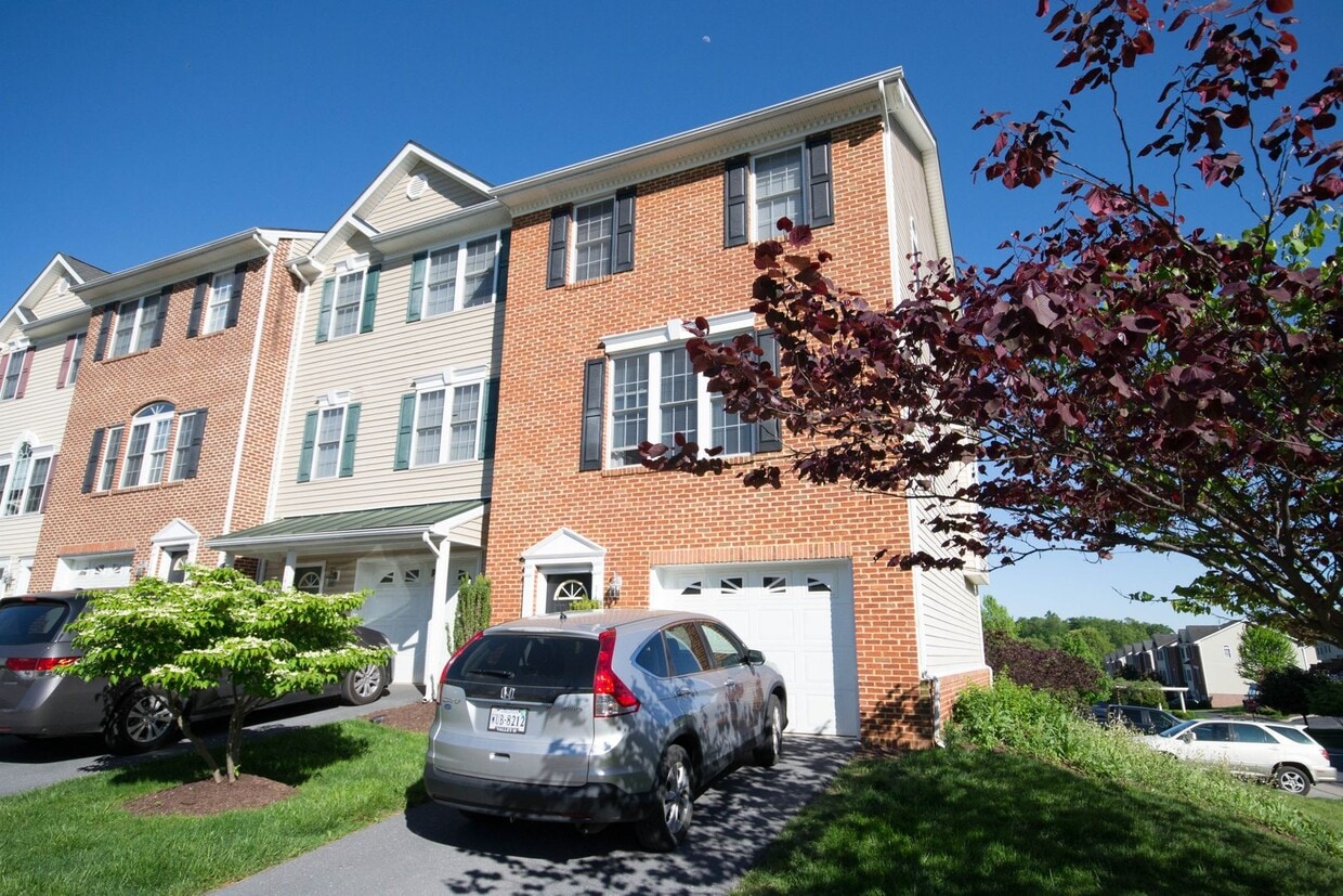 Primary Photo - End Unit Townhouse With Garage and Unfinis...