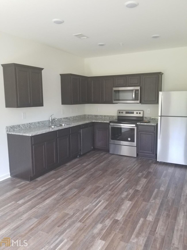 Building Photo - 1466 River Stone Trace NW