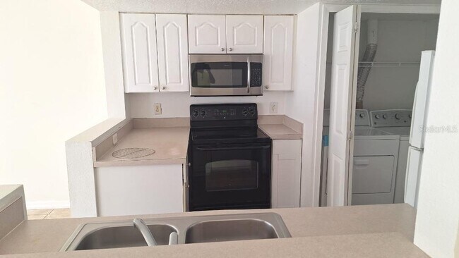 Building Photo - 1222 Washington Palm Loop