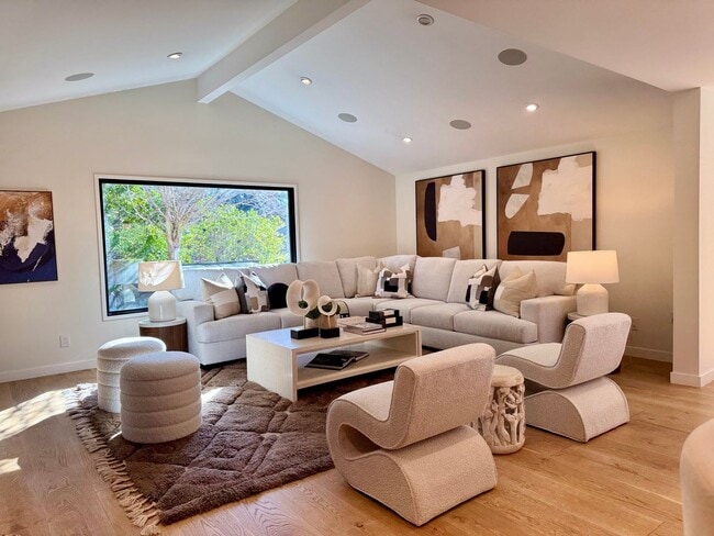 Building Photo - Designer 4BR Home with Pool and Indoor-Out...