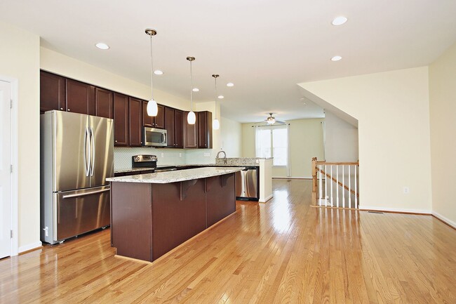 Building Photo - Pet-Friendly Townhome Minutes From NGIC, C...