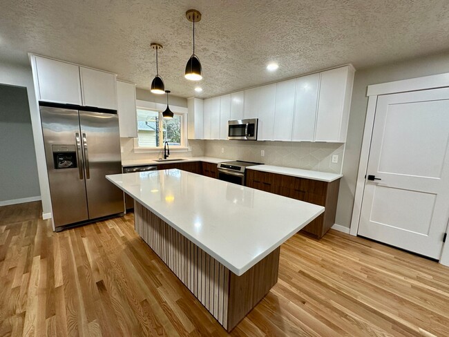 Building Photo - Tasteful, upgraded, remodeled ranch ramble...