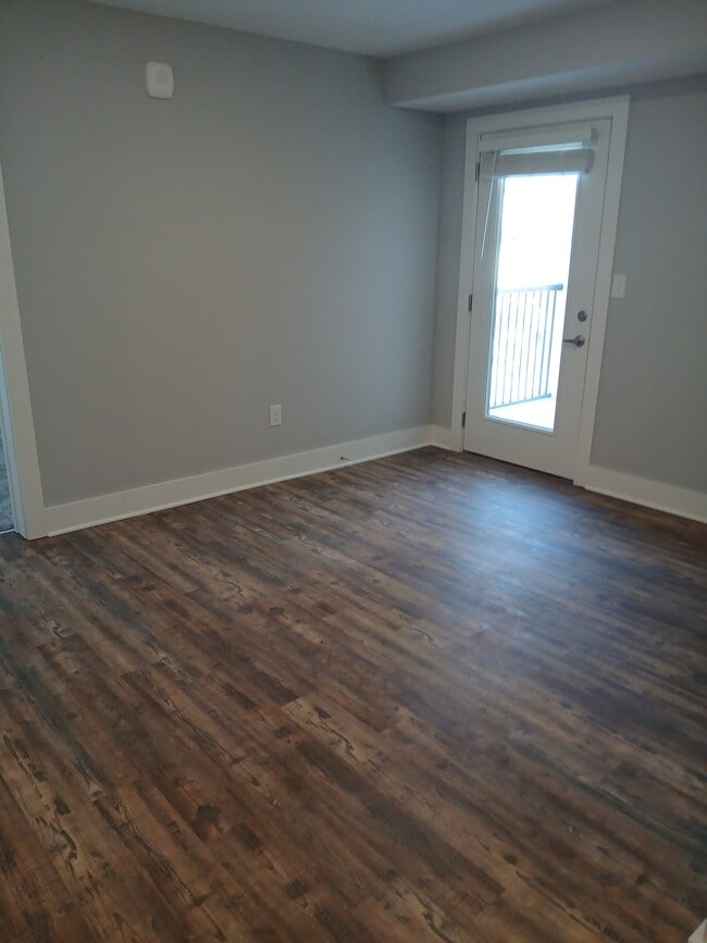 Living Area with French doors to patio/deck - Madison View Apartments