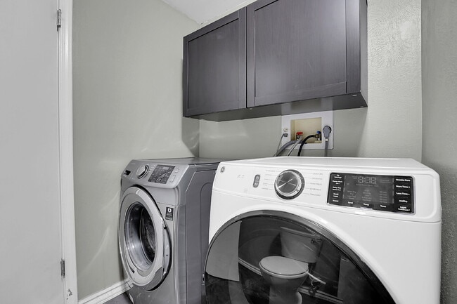 Building Photo - $2,720.95 - 4 bed, 2 bath, located in Aurora with attached Garage and In Unit Washer and Dryer!