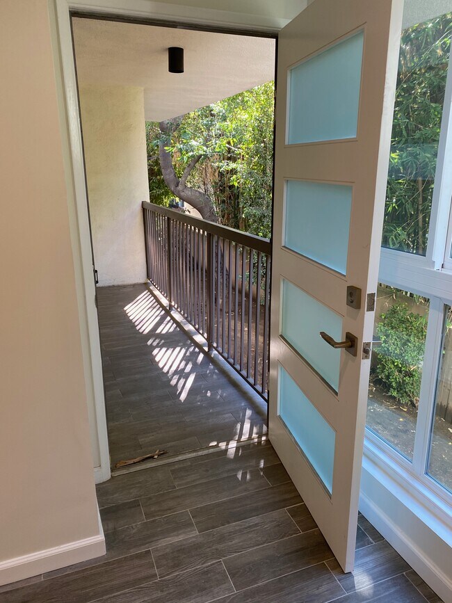 View from bedroom to balcony - 911 N Kings Rd