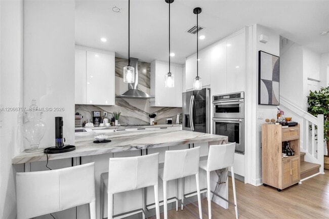 Photo - 21444 Northeast 2nd Avenue, Miami, FL 33179 - 3 BR 2.5 BA townhouse