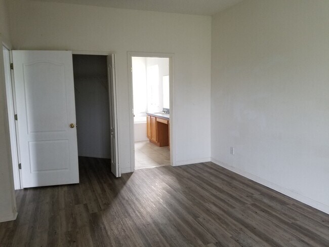 Building Photo - Lovely Four Bedroom with Pond View