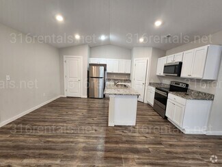 Building Photo - 1921 E 69th Ct N