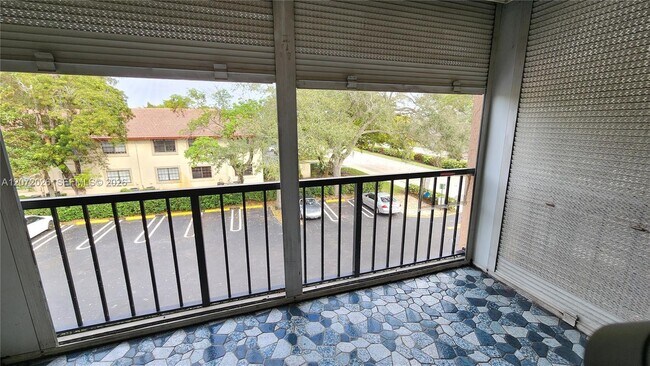 Building Photo - 2700 Coral Springs Dr