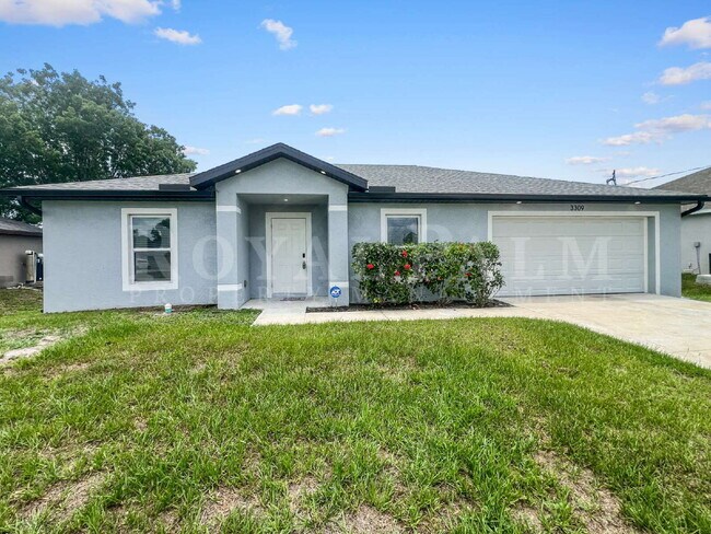 Building Photo - 4BR/2BA Home with High Ceilings, Garage & Large Kitchen Island