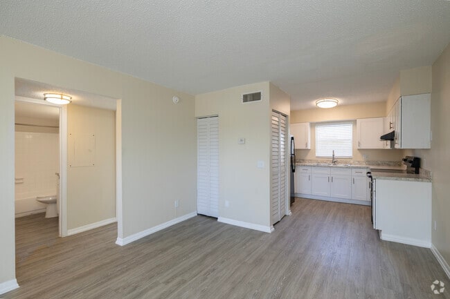 2BR, 2BA - 1,055SF - Living Room - White Lake Apartments