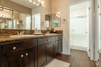 2BR, 2BA - Cannes - 1,185SF - Bathroom - Versailles on the Lake Apartments