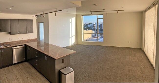 View from kitchen into living room - 285 W 6th St