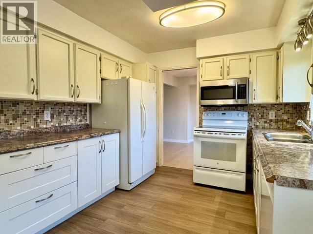 Photo du bâtiment - 5XX3 Wildwood Crescent