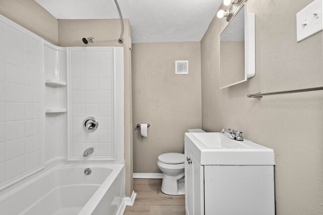Building Photo - A 4 BEDROOM GEM WITH A PRIVATE PARKING PAD...