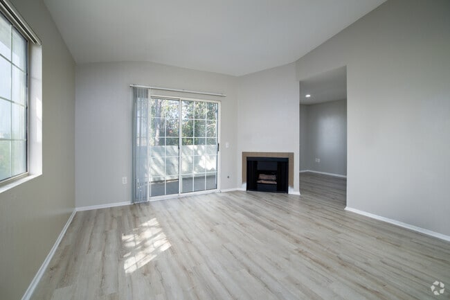 2BR, 2BA - 1,000SF - Living Room - Sunset View