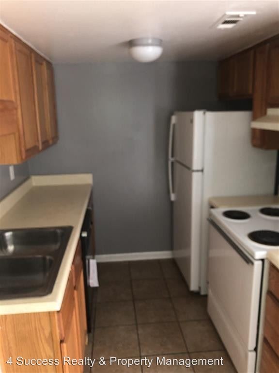 Foto del edificio - 5216 Flowering Peach Dr