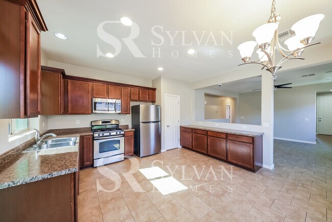 Building Photo - The living is easy in this 3 bedroom, 2 ba...