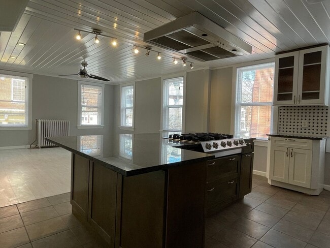 Building Photo - Small pets are welcome with an additional ...