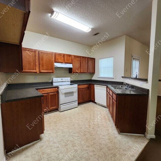 Building Photo - 7688 Creekside Ln