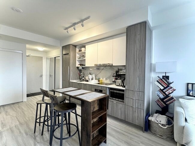 Photo du bâtiment - 55 Cooper St