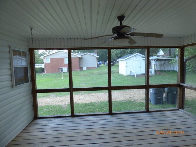 Screened in back porch, great for dinners. - 214 S Smithfield Rd