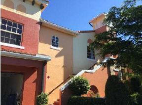 Outside entrance with Garage below - 8721 Piazza Del Lago Cir