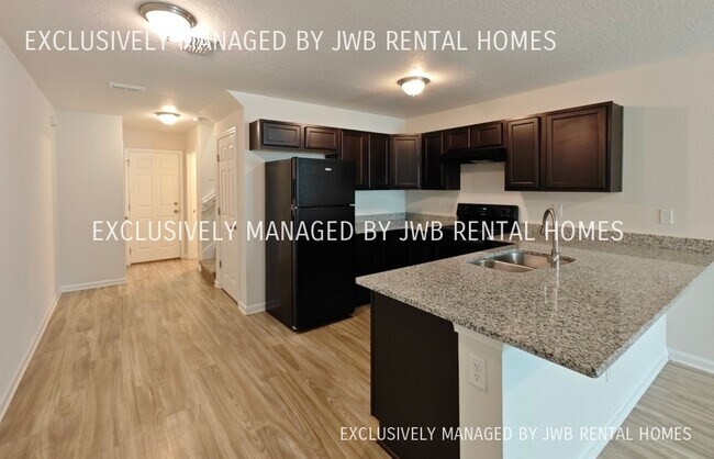 Foto del edificio - 8498 McGirts Village Ln